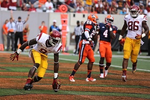 Marqise Lee scores the first touchdown of the game to put Southern California up 7-0 in the second quarter Saturday. The Trojans lead Syracuse 14-3 at the break.