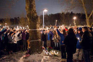 Westhill High School community members gather outside of the school for a candlelight vigil to honor Anna Pullano, who was killed in a car accident early Saturday. 