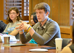 David Wolken, a representative from the Interfaith Alliance, speaks about the role religion shares with warfare during the Youth RIOT anti-war forum. Along with the Interfaith Alliance, the Syracuse Peace Council and the ANSWER Coalition also participated in the event.