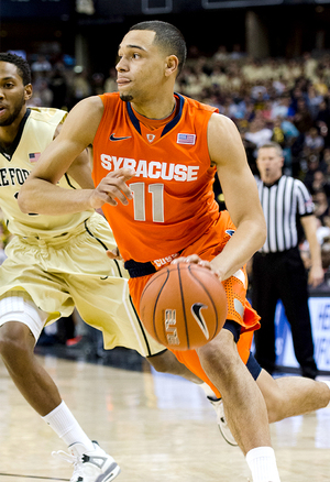 Tyler Ennis scored 16 of his 18 points in the second half, leading No. 2 Syracuse to a 67-57 win over Wake Forest Wednesday night. 