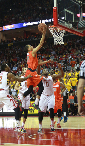 Tyler Ennis glides in for two in No. 4 Syracuse's 57-55 win over Maryland on Monday night. Maryland staged a strong second-half comeback, but fell short while the Orange avoided its third straight loss. 