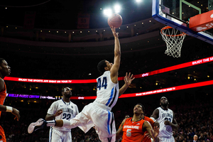 Syracuse held a 15-point first-half lead over No. 7 Villanova, but saw it evaporate in a foul-plagued second half. The Orange dropped an 82-77 overtime decision to its old Big East rivals. 