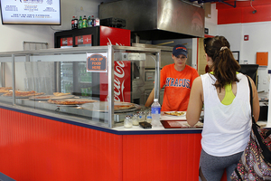 M Street Pizza is located in between Pita Pit and Calio’s. They make their pizzas in a double brick oven.