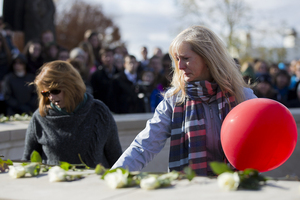 (From Left) Lauren Henry and Tami Zimmerman-Henry attend the Rose Laying Ceremony Friday afternoon.