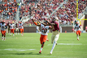 FSU's George Campbell extends his arm for a catch in the Seminoles' 45-21 win over Syracuse on Saturday. The Orange lost its fifth straight.