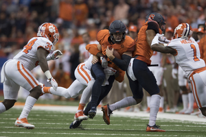 Eric Dungey tied a career high with three touchdown passes while also rushing for 61 yards in upsetting the Tigers.