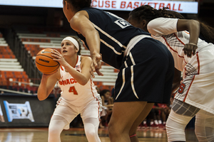 Mangakahia hit clutch free throws in overtime to secure the win for Syracuse.