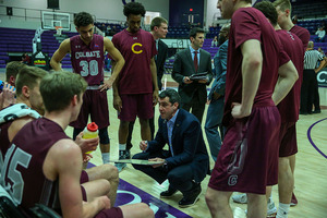 Matt Langel addresses his team in the huddle.