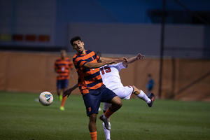 Massimo Ferrin challenges for the ball in SU's goalless draw with No. 20 Louisville on Friday night.