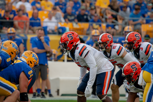 Syracuse hired Rocky Long to replace Tony White as a defensive coordinator.