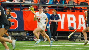 No. 6 Syracuse squandered a two-goal fourth quarter lead and fell to No. 7 Johns Hopkins 14-13 in overtime Monday. 