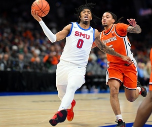 The Orange struggled to contain the Mustangs' three-guard tandem of B.J. Edwards (pictured), Boopie Miller and Chuck Harris, who combined for 31 points.