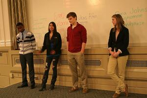 (From left) Flavio Somanji, Brianna Shetler, Lukas Alfen and Cara Johnson speak to Student Association representatives at Mondays meeting in hopes of being elected to the general assembly and having an influence on the Syracuse University community.