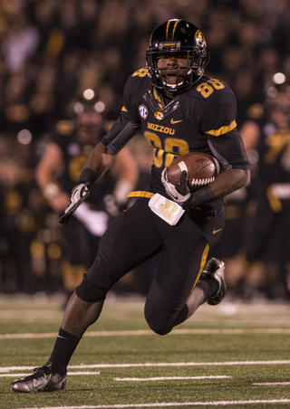 Wide receiver Jimmie Hunt runs in open space.