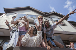 Party goers celebrate on top of a platform in Castle's Court.