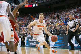 Cooney knives toward the lane with his left hand. 