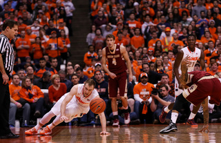 Cooney slips on the sideline while tracking a loose ball. The junior had five points on 2-of-5 shooting in the first half.