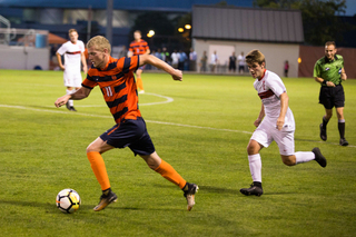 Syracuse looks to push the ball into space, though the Orange found little openings. 