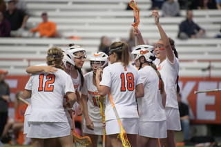 Syracuse celebrates during its 23-11 win. 