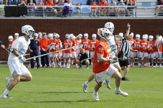 Danny Varello takes the ball off the faceoff