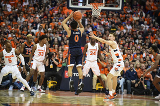 Virginia point guard Kihei Clark scored 10 points and dished out seven assists on Wednesday night. 