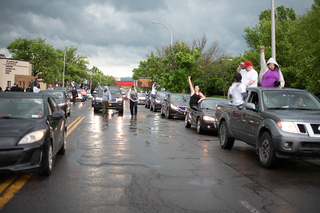 The protest included cars tailing people on foot, constantly beeping their horns and keeping their fists up in solidarity.